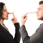 man and woman facing each other with long noses telling lies