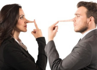 man and woman facing each other with long noses telling lies